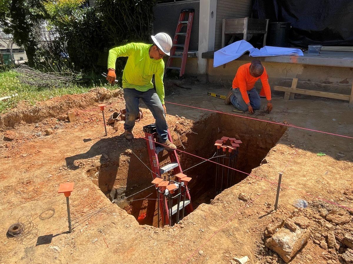 Shelnutt Senior Center Updates two men digging