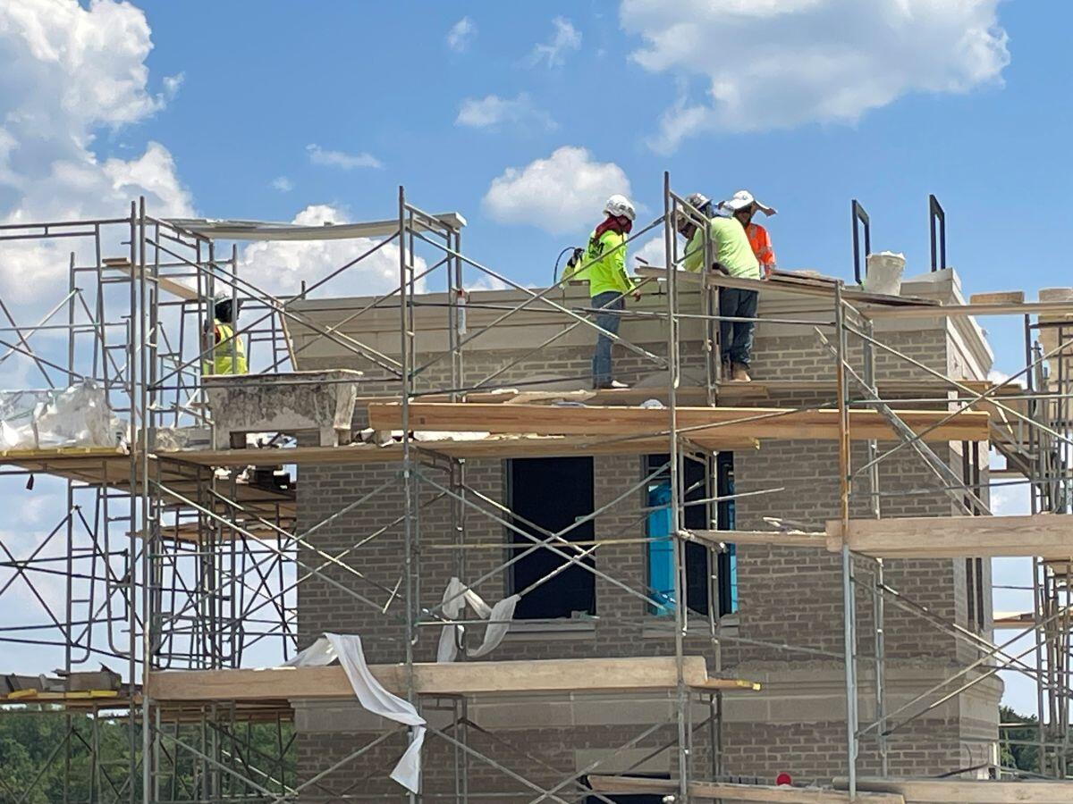 Clayton County Fire Station No. 1 Replacement men on scaffold outside of building