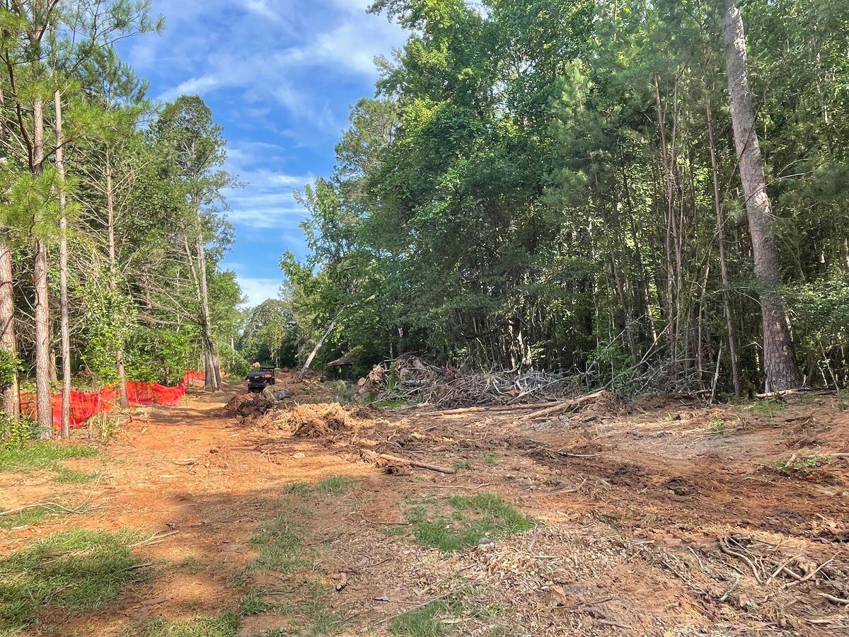 River's Edge Phase IV pathway with dirt mound in the middle