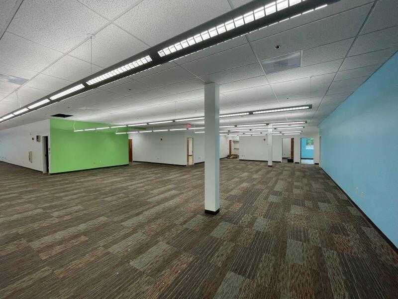 Small business incubator painted room with flooring done