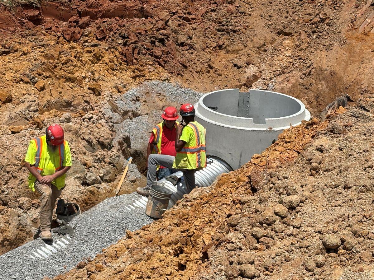 Clayton County Administration Building Men working underground