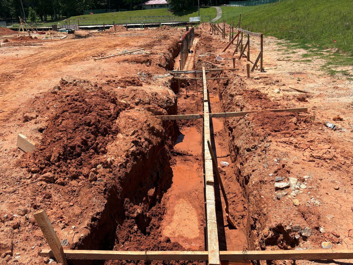 Lakeview Events Center Amphitheater Deep trench with Pipe