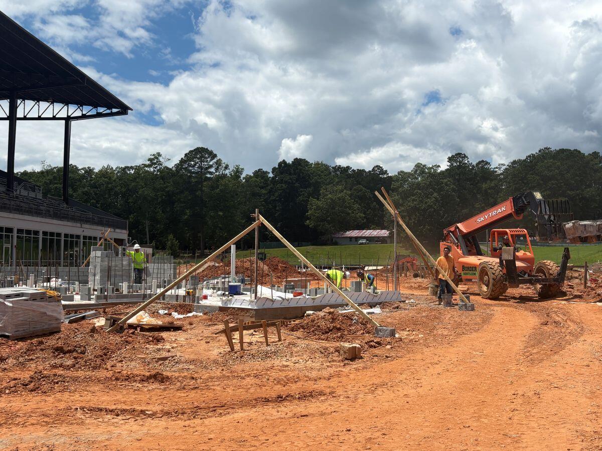 Amphitheatre with cranes on site
