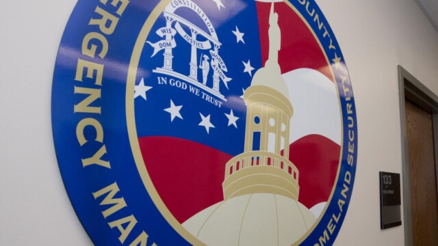 Clayton County Emergency Management Services logo sign on wall