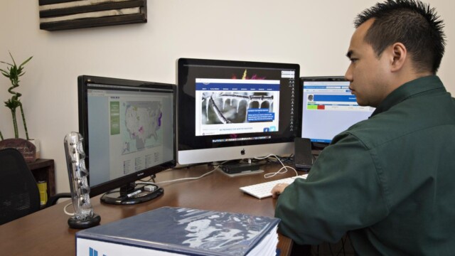 Phong Nguyen working at his desk