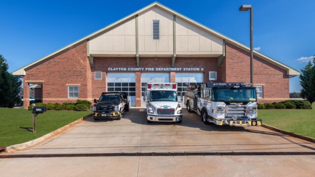 3 vehicles in front of fire station