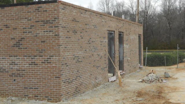 Side of building with exterior walls completed