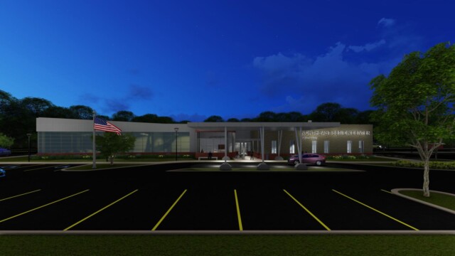 artist rendering of building at night with car up front