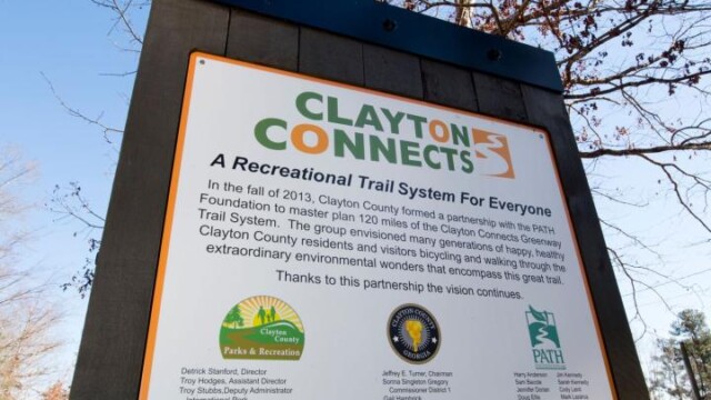 Clayton Connects signage on a trail