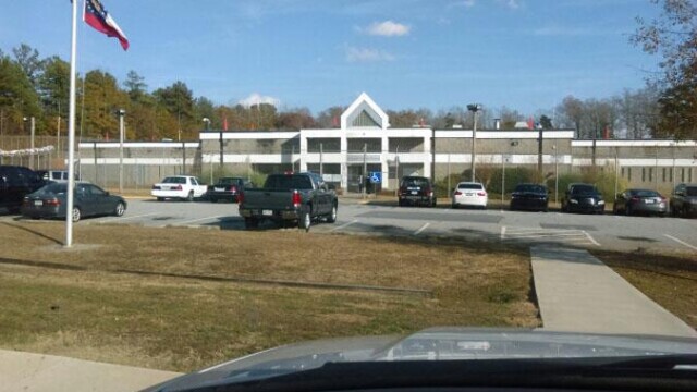 Clayton County Prison - Parking Lot Showing American And State Flags Clayton County Prison - Parking Lot Showing American And State Flags
