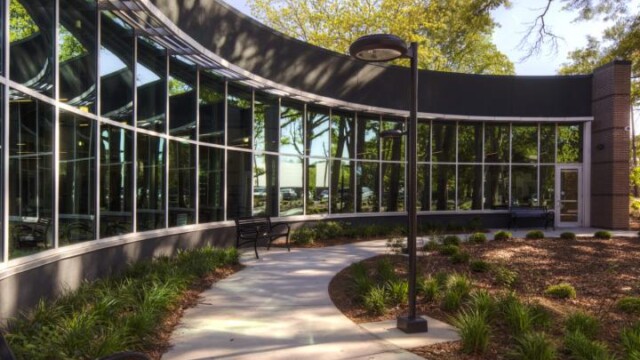 arched row of windows on outside of building