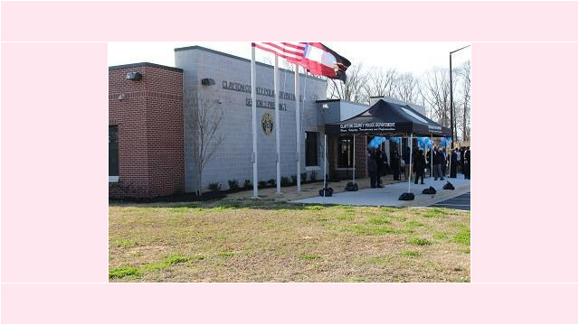 flag poles in front of new building