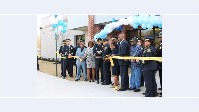 ribbon cutting ceremony with group of people