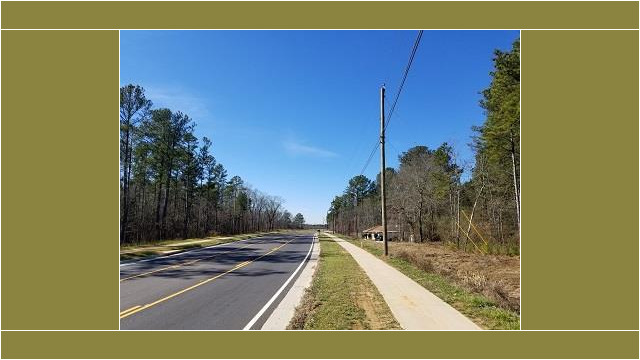 Anvil Block road with empty sidewalk
