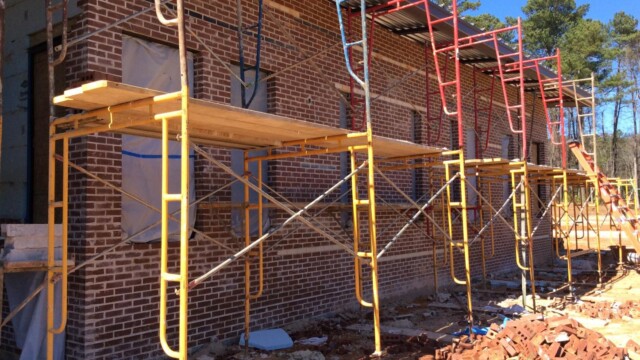 Work platforms in front of an exterior wall