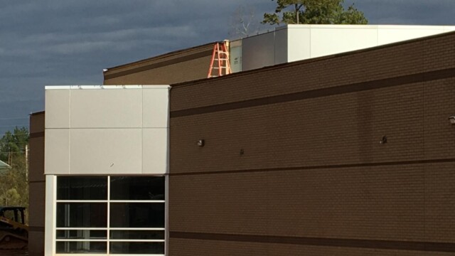 An orange ladder on the rooftop
