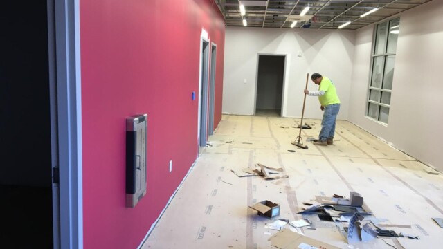Construction worker prepping floor work