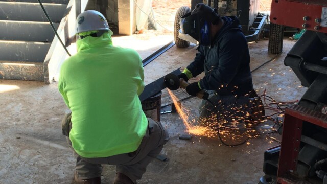 Lake Spivey Recreation Center - Men Working With A Mini Circular Saw Lake Spivey Recreation Center - Men Working With A Mini Circular Saw