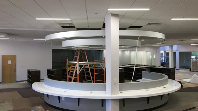 NW Library computer desks counter area lighting being installed