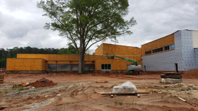 Exterior of building with walls filled in with insulation
