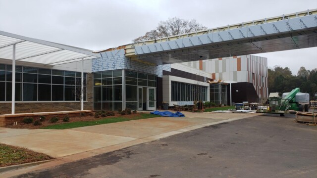 Construction of overhead cover at entrance to Flint River Community Center