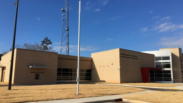 Radio tower and flagpole at NW Library