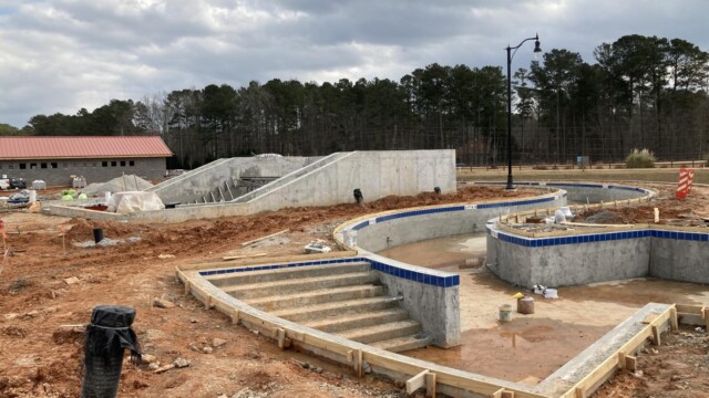 Pool walls being formed with concrete