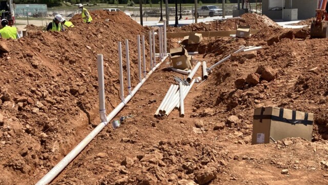 sewage pipes being placed underground
