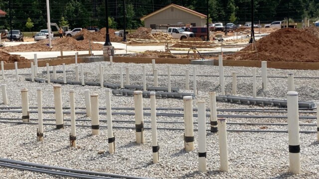 Cables and PVC pipes awaiting to be covered with cement