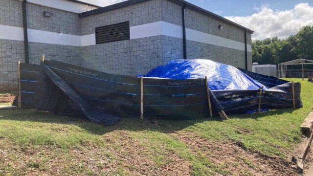 Clayton County Prison - Tarp Over Dirt Pile Clayton County Prison - Tarp Over Dirt Pile