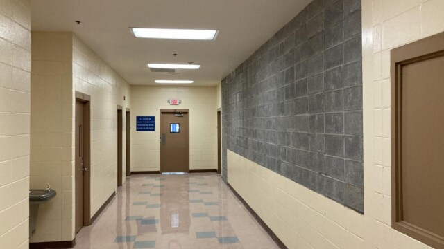 Clayton County Prison - Hallway With Shiny Marble Floor Facing The Exit Door Clayton County Prison - Hallway With Shiny Marble Floor Facing The Exit Door