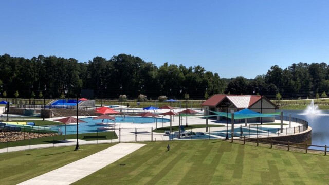 International Water Park with water hydrant on installed green lawn