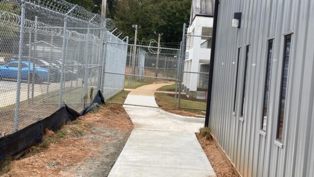 Clayton County Prison - Fenced In Fenced Off Walk Way Clayton County Prison - Fenced In Fenced Off Walk Way