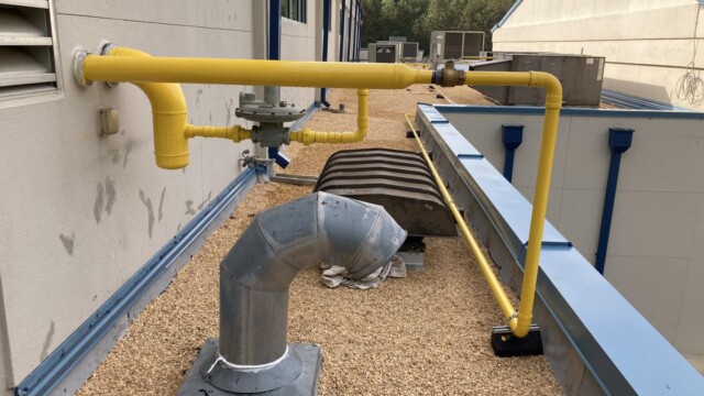 Jim Huie Roof with a/c units and roof vent