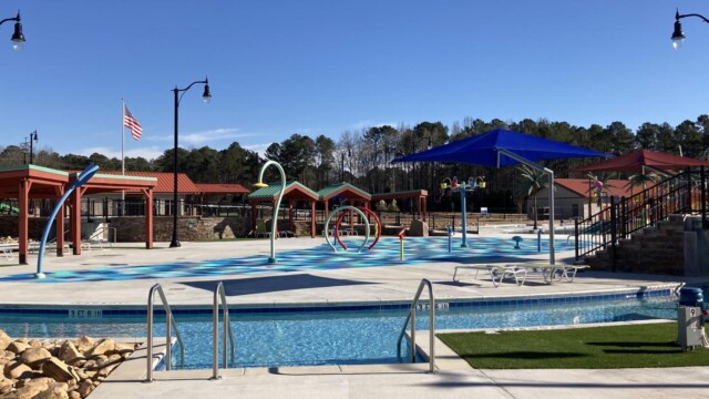 International Water Park with pool steps near splash pad