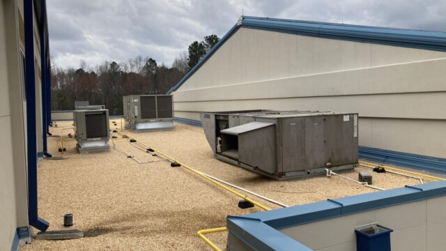 Jim Huie Roof with three a/c units
