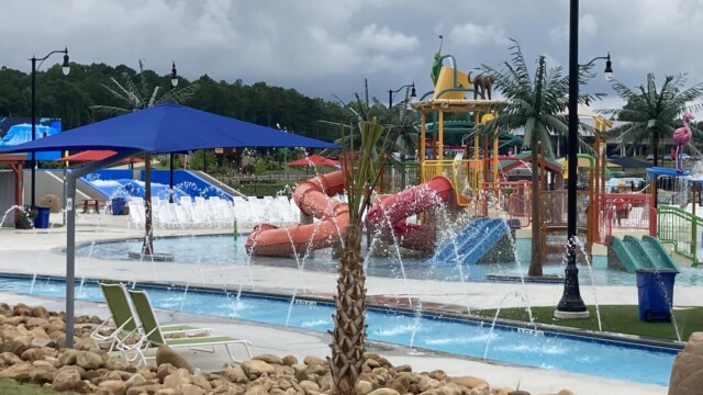 International Water Park with palm trees and water shooting into the air