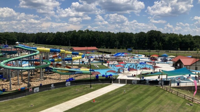International Water Park with people enjoying water zoomed out