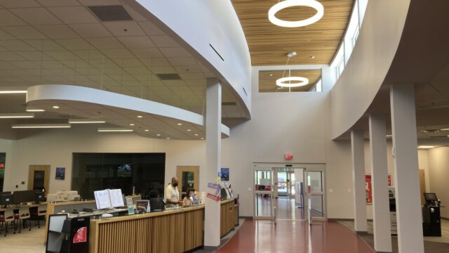 Exit pathway of NW Library with circulation desk on left