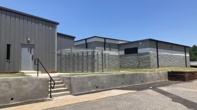 Clayton County Prison - Parking Lot With Paved Road Side Entrance Clayton County Prison - Parking Lot With Paved Road Side Entrance