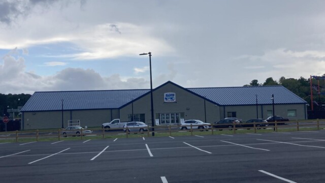 Nassau Building with cars in the parking lot