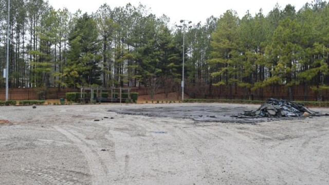 Progress of demolition of old tennis court surface