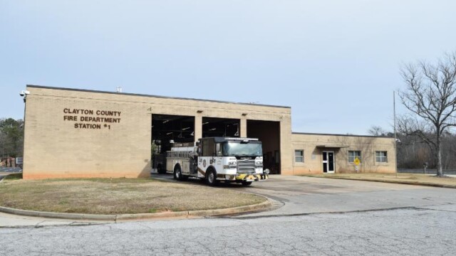right side view of fire truck outside fire station