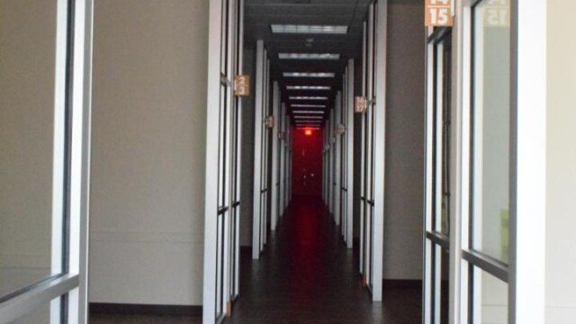 view down hallway to emergency exit