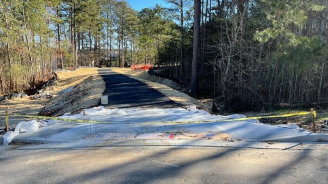 taped off entry to the new path from street