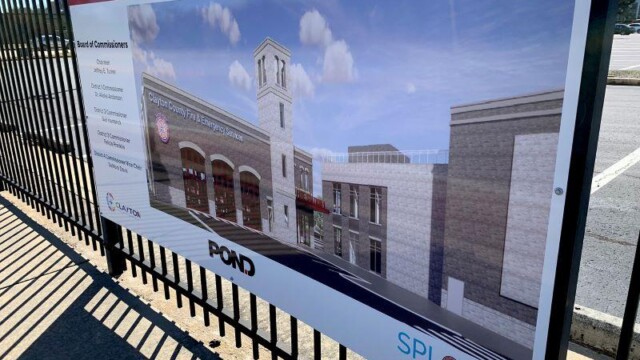 sign showing rendering of new fire station