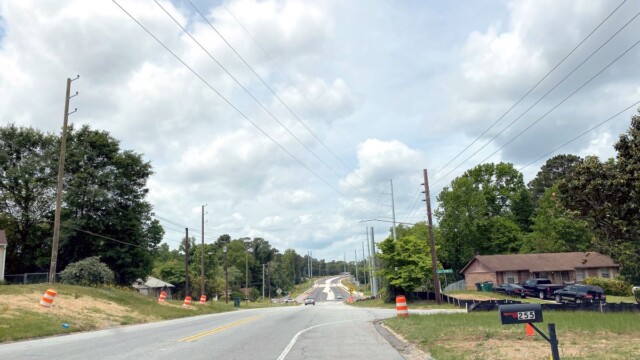 Valley Hill Rd widening with cars driving