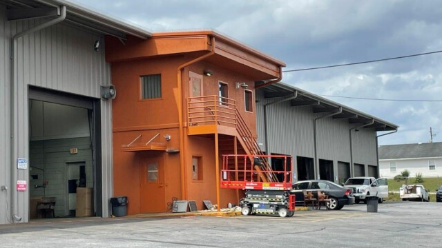 wider view of orange section of building