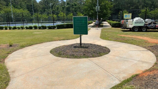 Tennis Rules and Regulations signage at Independence Park