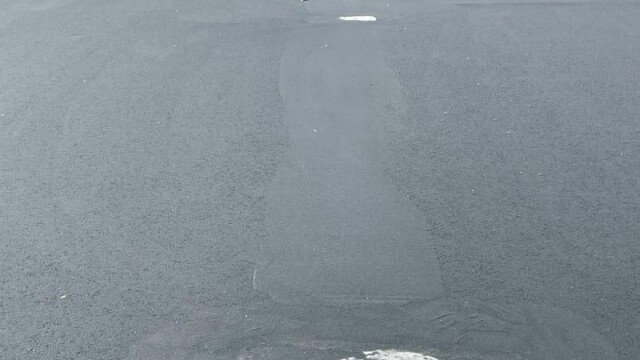 Resurfaced court surface, unpainted